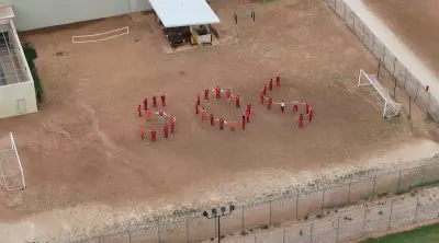 Trump admin hits back after alleged Ten de Aragua gangbangers spelled out ‘SOS’ in detention yard