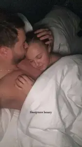 Chris Hughes shares intimate photo of himself and ‘sleeping beauty’ JoJo Siwa cuddling in bed
