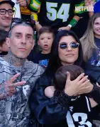 Kourtney Kardashian and Travis Barker make rare public appearance with son Rocky, 1, at WWE event