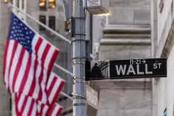 Global shares slide and US futures and dollar drop after Moody’s downgrade of US credit rating